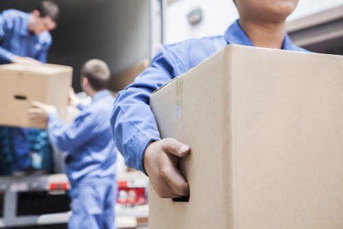 Student removals team loading boxes in London