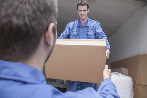 Careful packing materials and labelled boxes for London home relocation