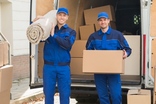 Staff member preparing packing and lifting equipment for a safe removal