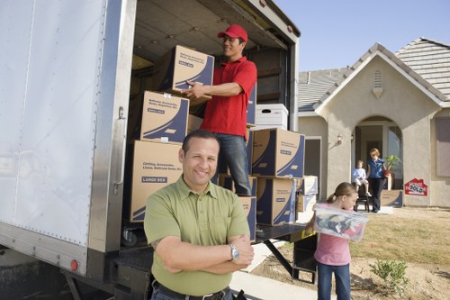 Professional removal company in London handling home moving boxes