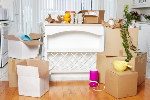 Calculator and boxes representing cubic-yard rates for removal quotes