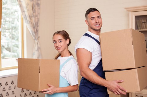 Packed moving boxes inside a London apartment