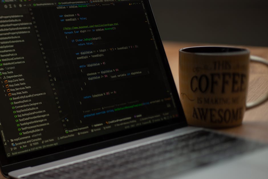 Close-up of a computer screen displaying complex lines of HTML and JavaScript code with highlighted functions and tags in multiple colors. The code features various elements related to webpage structu